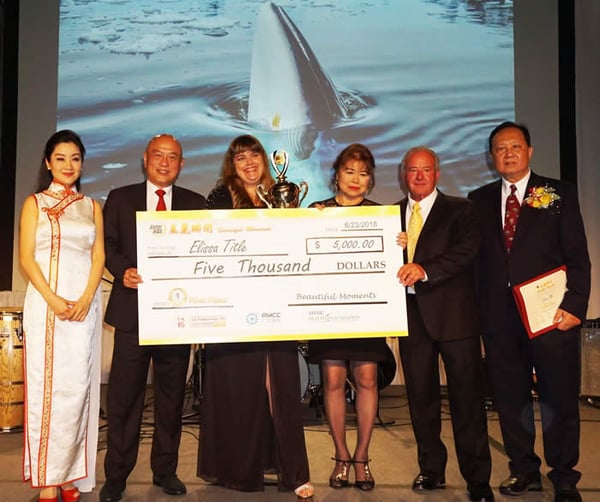 SolarMax CEO David Hsu awards Elissa Title 1st place in the “SolarMax Beautiful Moment” Photography and Essay Contest 
